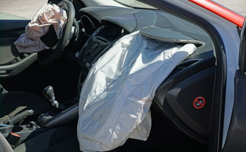 Inside of a car with its airbags deployed.