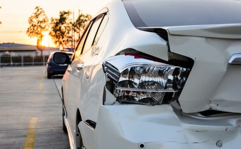 A white sedan has a Fender Bender. Read Turk's Collision Center Blog to learn more!