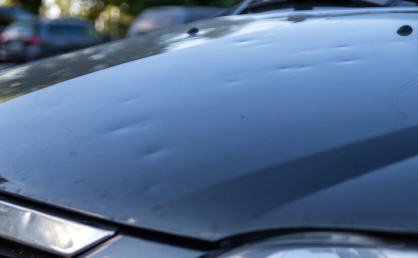 Hail Damage on the hood of a car. Learn how to repair damage at Turks Collision Center